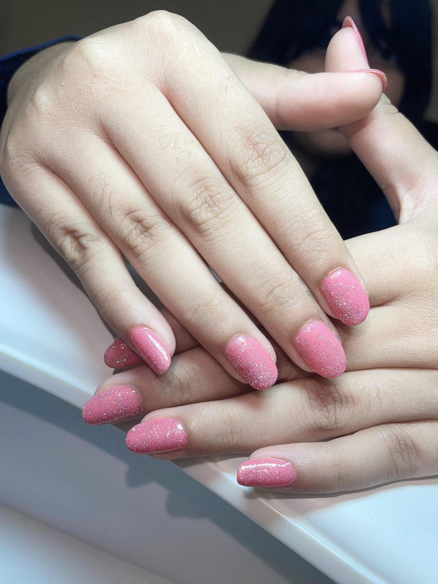Pink glitter gel polish with fine shimmer by Kim's Studio Lahore