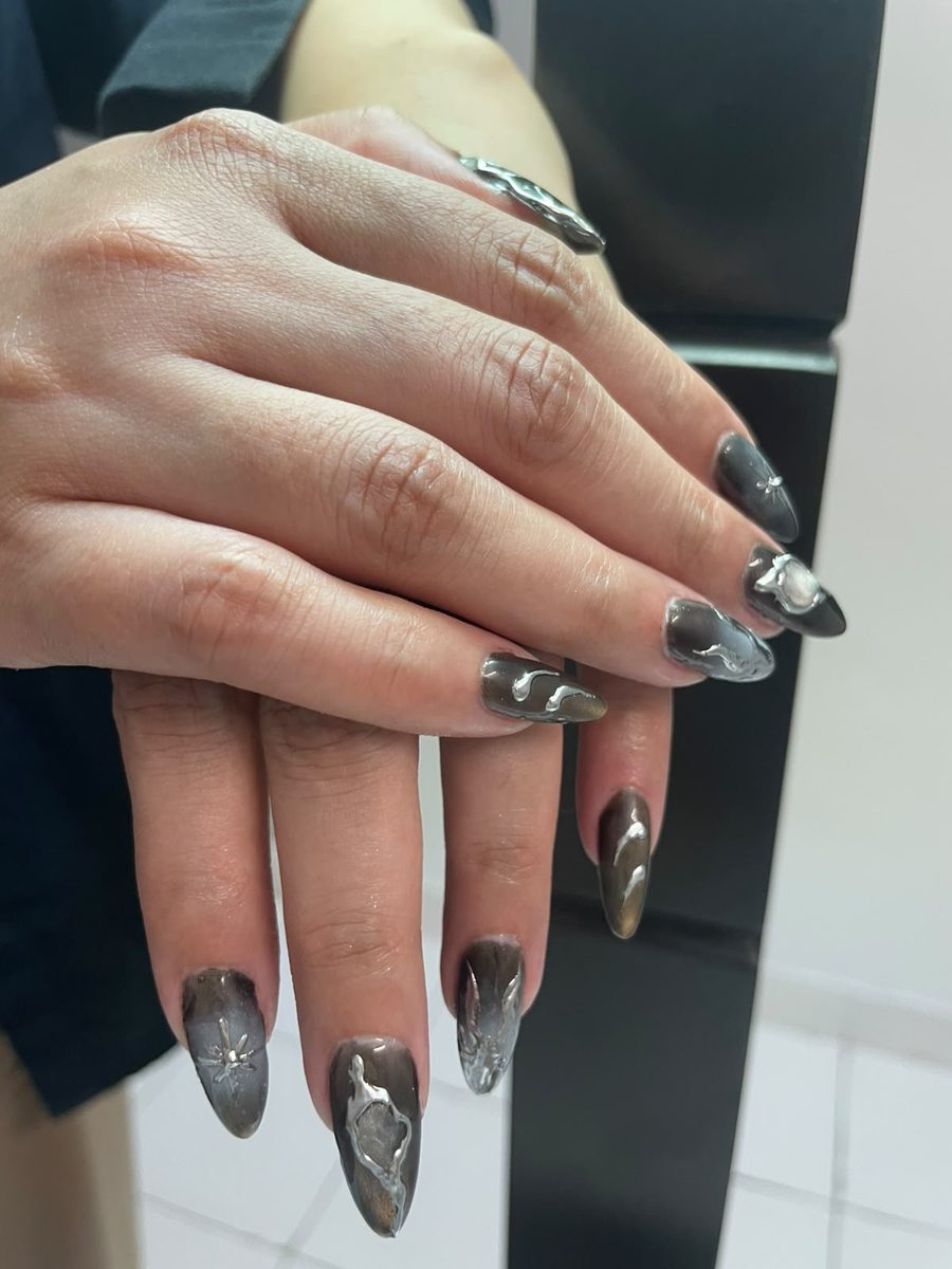 Dark chrome nail set with 3D silver detailing by Kim's Studio Lahore